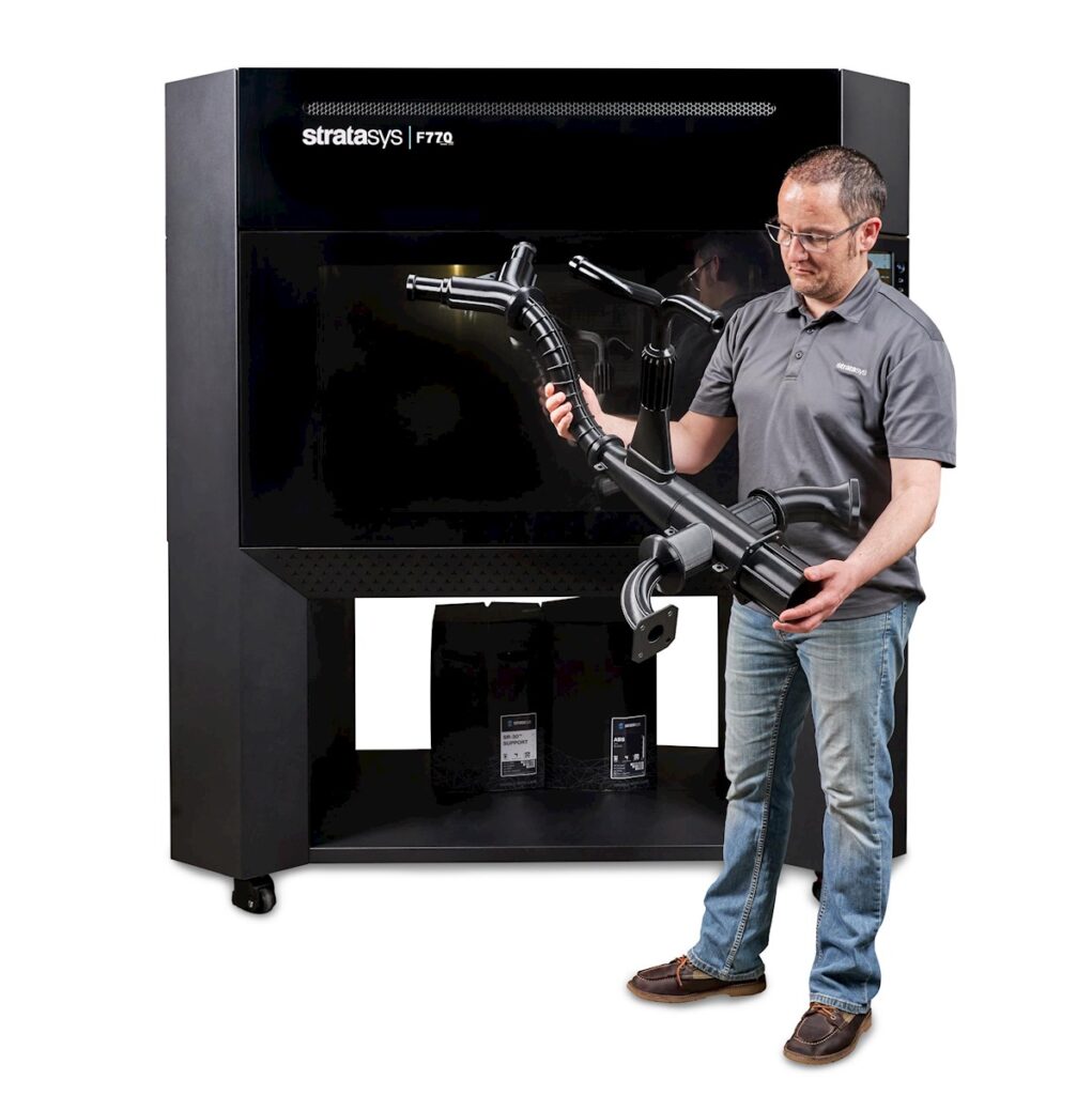 f770 with man and printed part